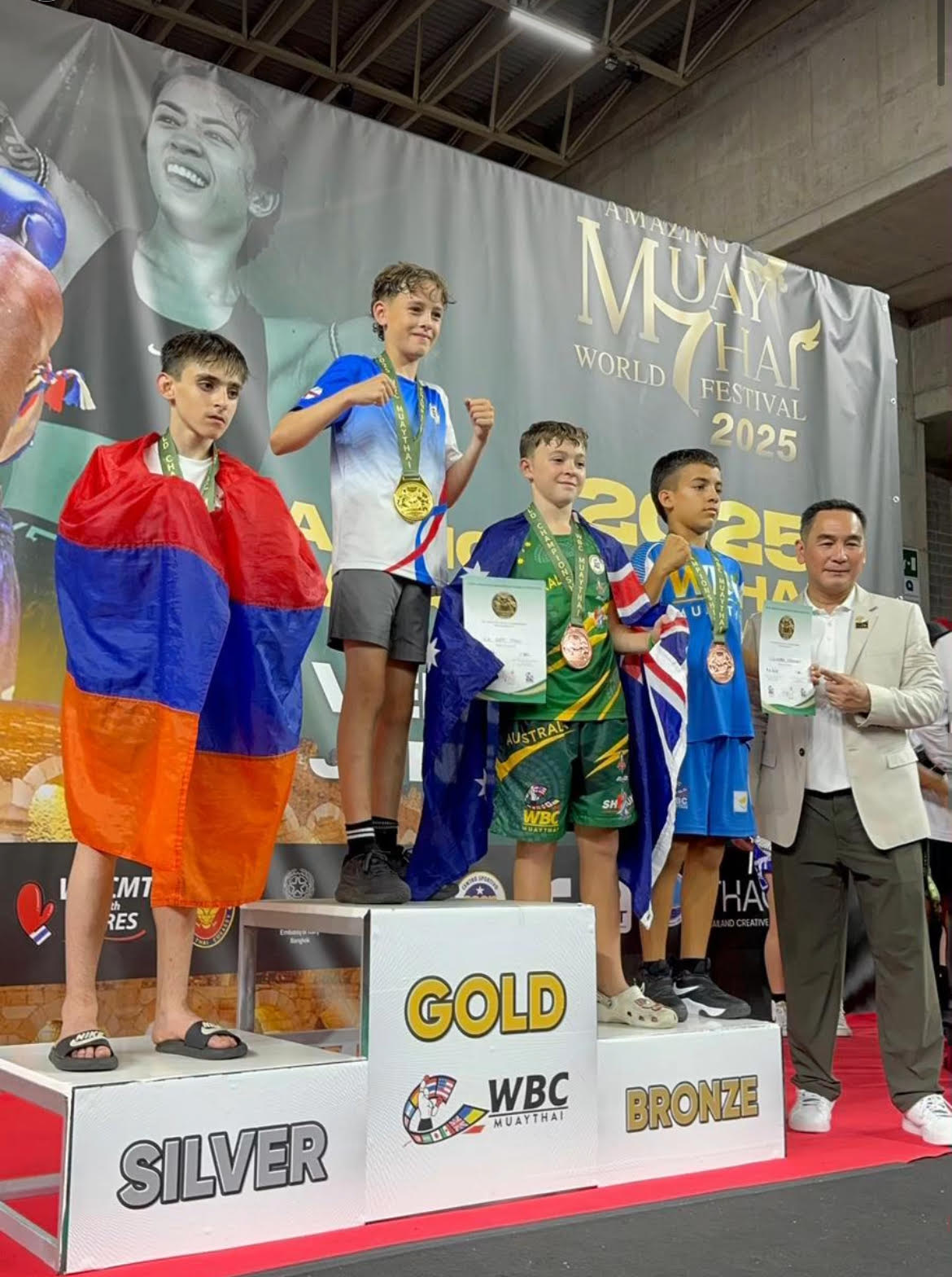 Travis Abercrombie on the Gold Medal podium at the Amazing Muay Thai World Festival 2025, Verona, Italy